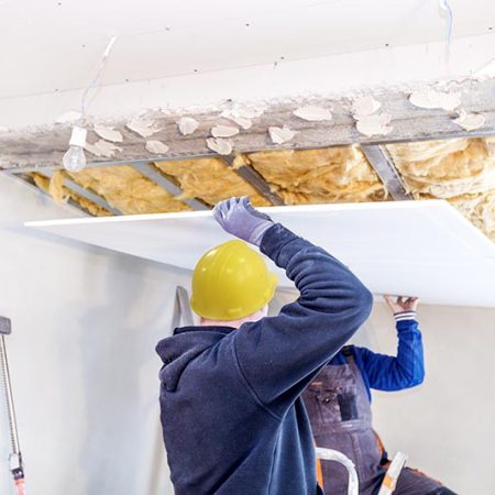 workers-carrying-drywall-for-ceiling_Dagmara_K_Shutterstock